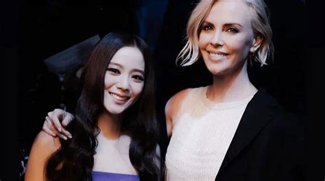 BLACKPINK's Jisoo receives warm hug from Charlize .